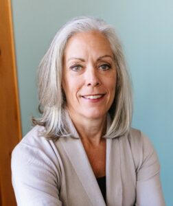 a close-up headshot of author, Stephanie Flood